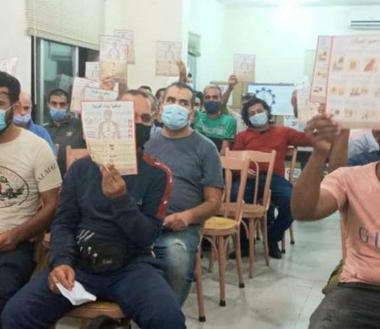 جمعية عمومية لنقابة عمال البناء للتوعية على الفيروس